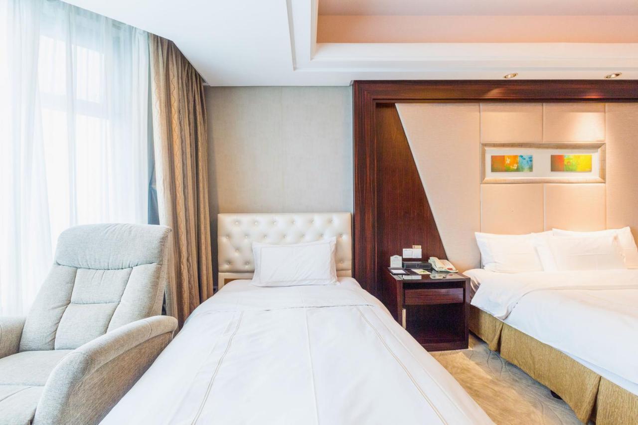 Shu Guang International Hotel Nanquim Exterior foto