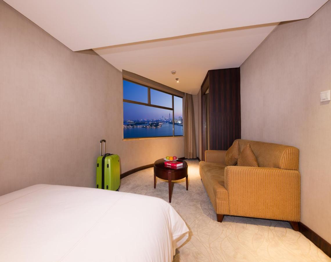Shu Guang International Hotel Nanquim Exterior foto