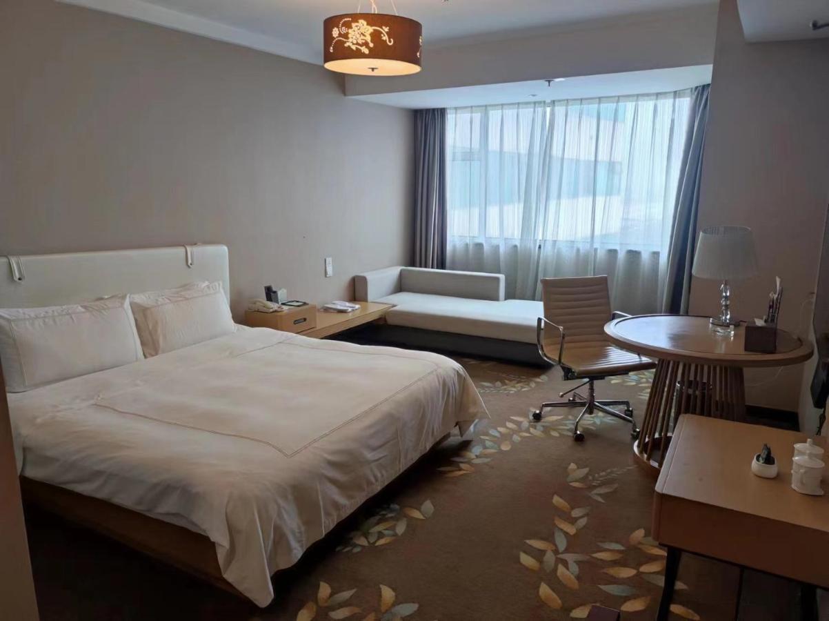 Shu Guang International Hotel Nanquim Exterior foto
